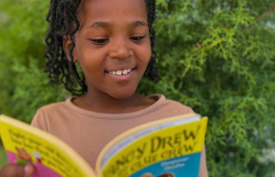 girl reading a book