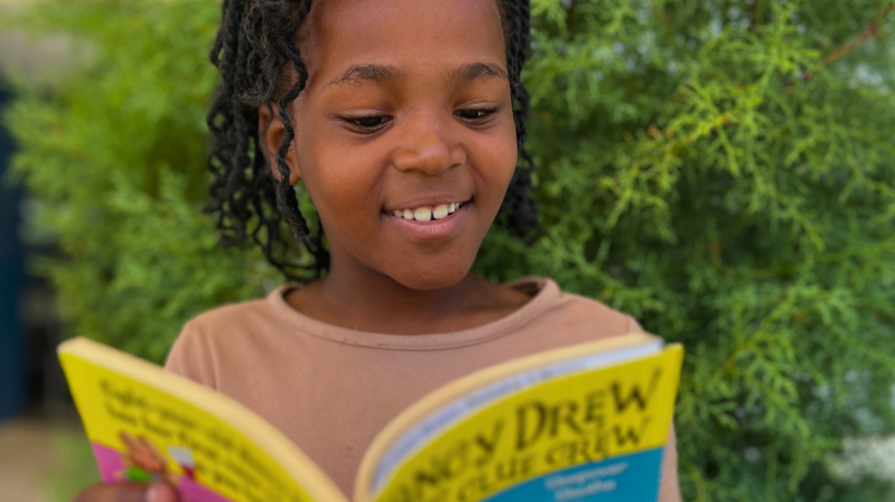 girl reading a book